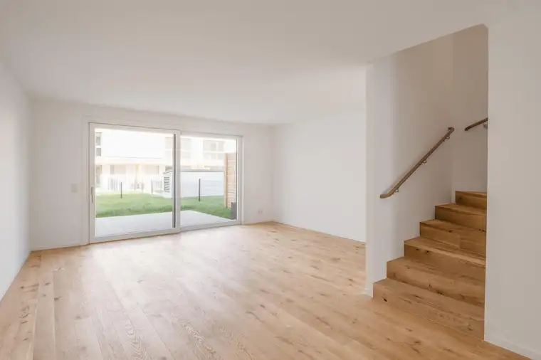 Grüne Ruhe trifft kühlen Komfort - Ihre Stadtvilla mit Ausblick