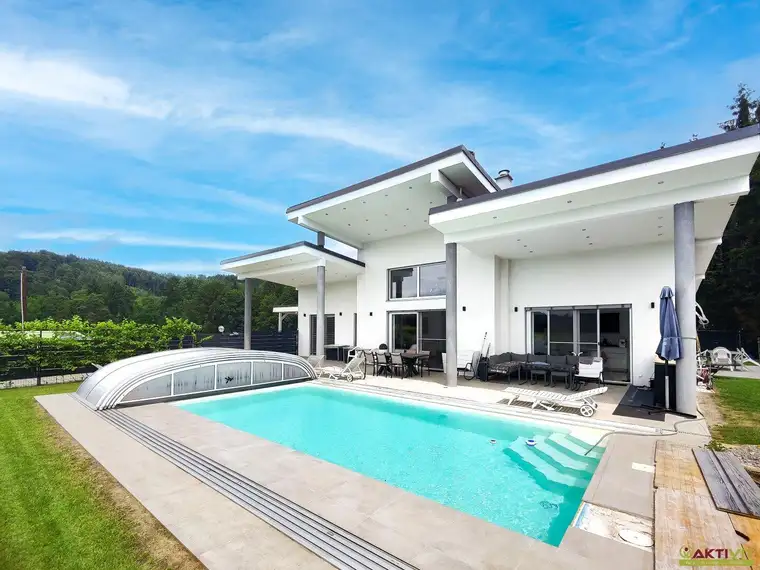 Modernes Designerhaus nahe Graz mit Pool, Photovoltaik und 6m Raumhöhe. Hochwertigste Ausstattung.