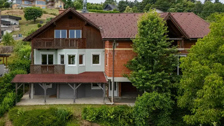 Vielseitiges Haus samt Rohbau-Erweiterung, großem Carport &amp; wunderschönem Garten in Bad Schwanberg