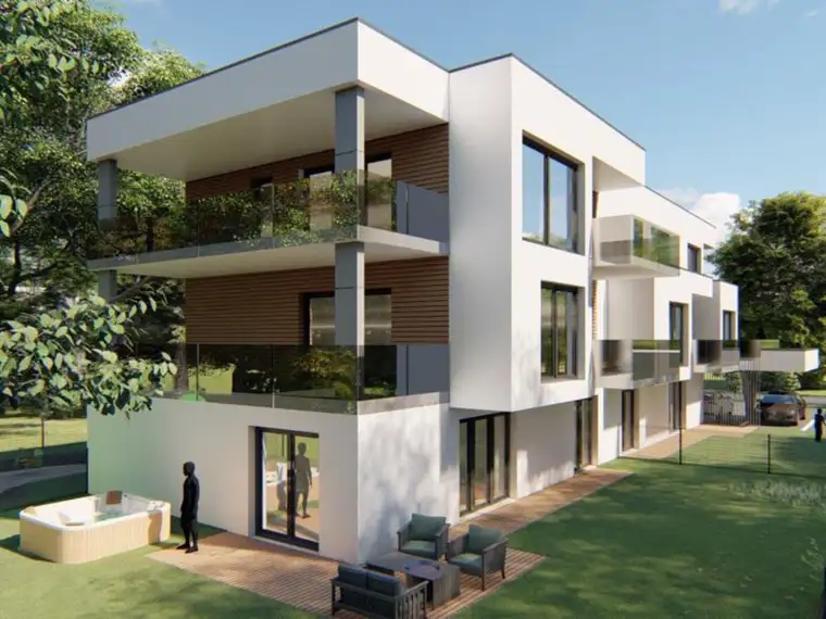 Neubau: Sonnige Gartenwohnung mit großer Terrasse u. Parkplatz.