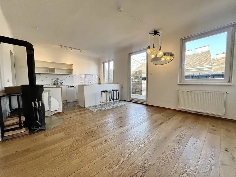 Traumhafte 90m² Dachgeschoßwohnung mit Terrasse in 1050 Wien !