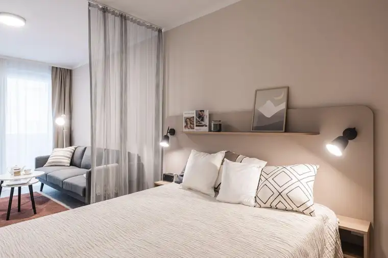 Pauschalmiete I JONN-Y möbliertes Apartment mit Balkon, inkl. Gym, Sauna, Dachterrasse, Community Area, Internet etc.! 7 Min. zum Stephansplatz!