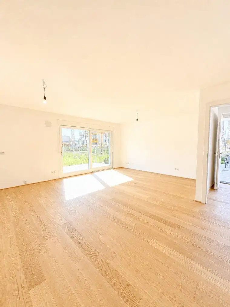 ***Provisionsfrei**NEUE**Helle 121 m² Eigentumswohnung – Erstbezug mit ca.100 m2 Garten, Balkon &amp; Terrasse