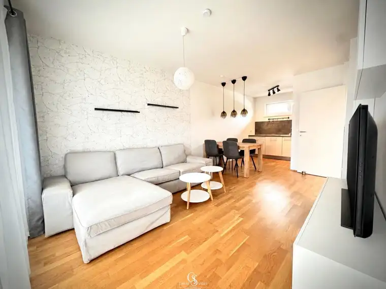 Sonnige 2-Zimmer-Eigentumswohnung mit großer Terrasse und Carportstellplatz