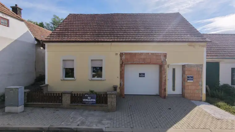 Mehr dahinter, als man von außen erwartet. | € 104.500,- | uneinsehbarer Innenhof | 31 m² Garage | bereits teilweise modernisiert
