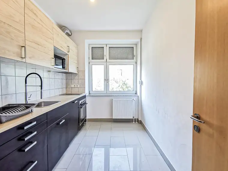 Attraktive 3-Zimmer-Wohnung mit Gemeinschaftsgarten und Parkplatz