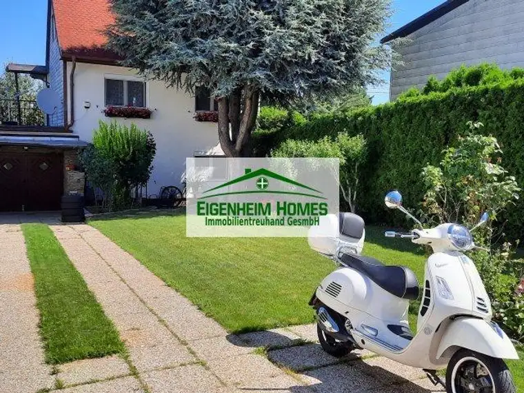 Einfamilienhaus mit gepflegtem Garten und Garage