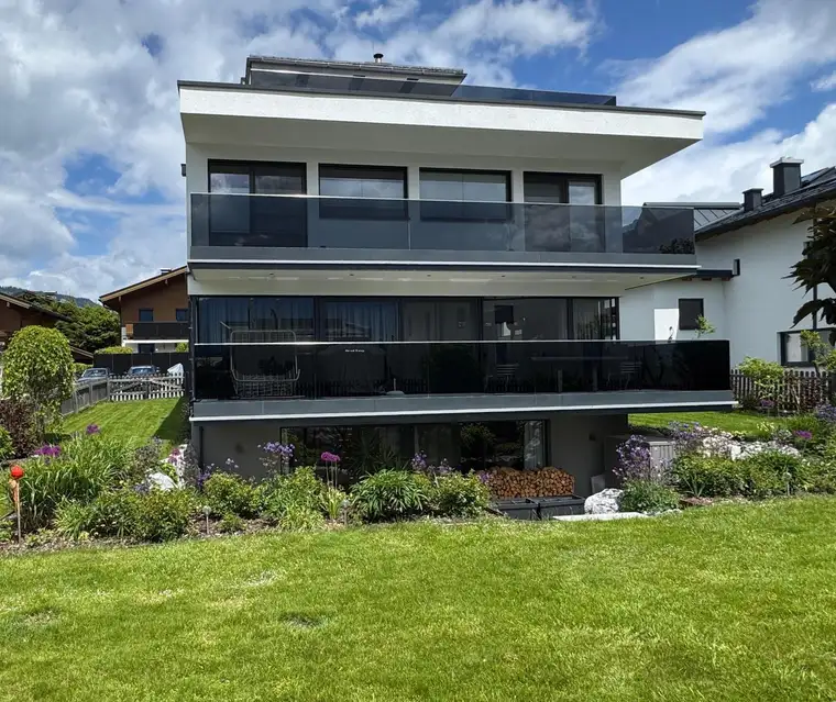 Großzügiges Einfamilienhaus in Saalfelden-Dorfheim: Exklusives Massivholzhaus mit Panorama-Dachterrasse und traumhaftem Rundumblick