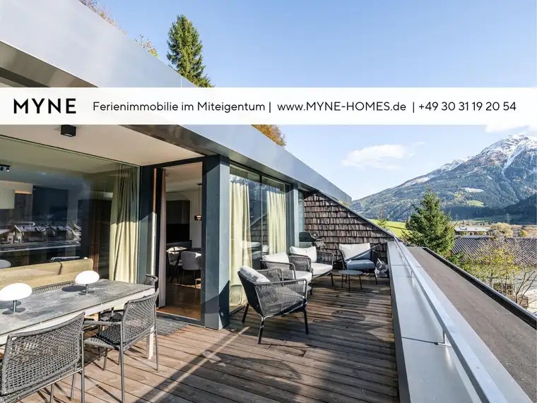 Ferienimmobilie im Miteigentum: Moderne Terrassenwohnung mit Panoramablick auf die Berge