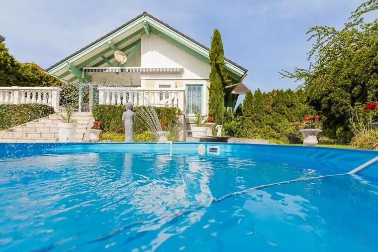 Gemütliches Einfamilienhaus mit liebevollem Garten, Pool, Photovoltaik und LW-Pumpe - Traiskirchen - neuer Preis