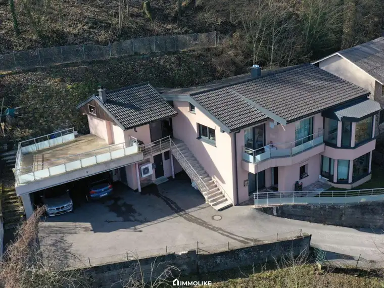 Ein Haus, zwei Wohnungen, viel Stadtblick – Ihr Zweifamilienhaus in Thalheim bei Wels!