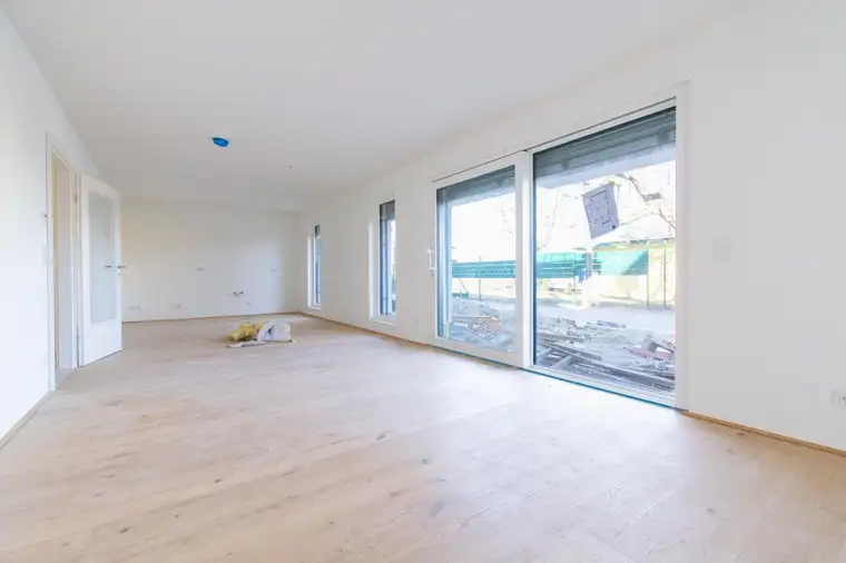 Erstbezug: Familientraum mit 3 Zimmern, 52 m² Kellergeschoss, Garten und Terrasse!