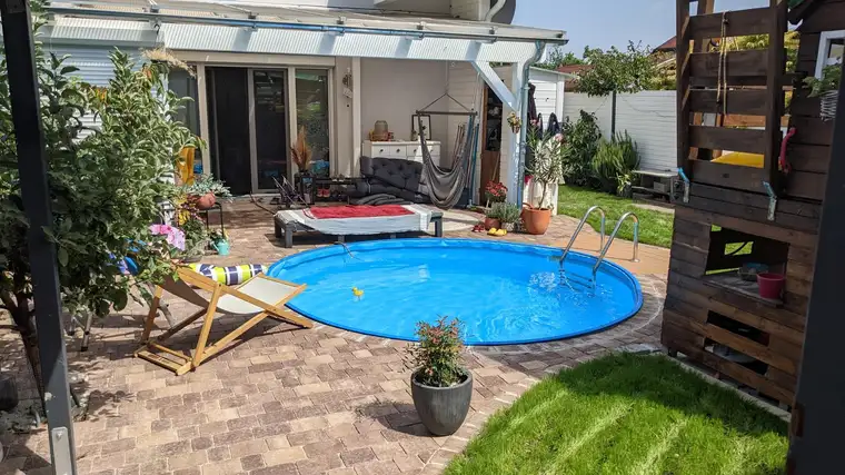 Eckreihenhaus in verkehrsruhiger Siedlung mit wunderschönem Garten!