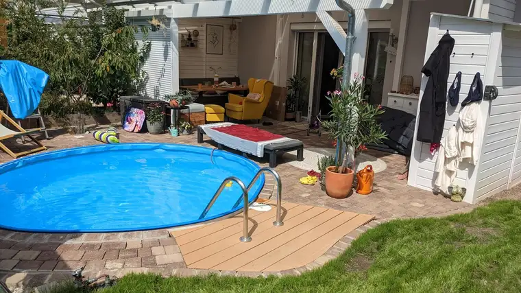 Eckreihenhaus in verkehrsruhiger Siedlung mit wunderschönem Garten!