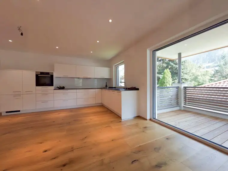 Ihr Wohlfühl-Zuhause in Niederau – elegante Wohnung mit Designküche und Balkon mit Bergblick