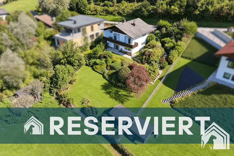 Ein Zuhause mit Charakter: Einfamilienhaus mit Garten in Hanglage und Blick ins Grüne