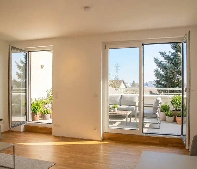Erstbezug am Mühlwasser – 2-Zimmer-Dachgeschosswohnung mit Terrasse und Balkon