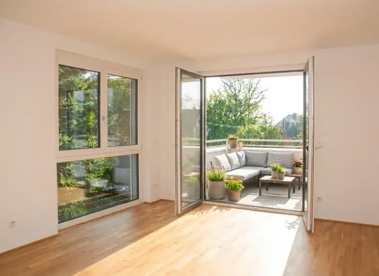 Erstbezug am Mühlwasser – 3-Zimmer-Wohnung mit ca. 16 m² Balkon und großzügigem Wohnbereich
