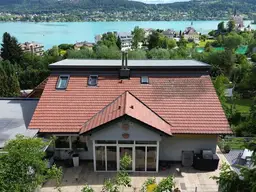 Exklusives Seehaus in Maria Wörth: Zwei Wohneinheiten mit rundum Seeblick &amp; Gartenidylle