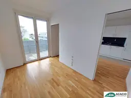 Top-Singlewohnung mit großem Balkon - Leben im Grünen, aber nahe der Stadt! Tiefgaragenplatz optional verfügbar!