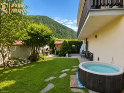 Ein Ort zum Wohlfühlen – 3-Zimmer-Wohnung mit sonnigem Garten, Bergblick und eigenem Parkplatz