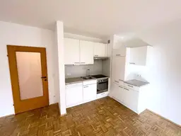 Ruhiger 1 ZIMMER-NEUBAU + neuwertige Einbauküche + neuwertiges Bad mit Dusche und WC + nähe KF-Uni!