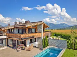 Alpiner Stil &amp; höchster Komfort: Chalet mit traumhaftem Bergblick &amp; Pool