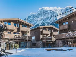Tiroler Alpenzauber: Luxuriöses Gartenapartment am Fuße der Zugspitze