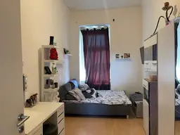 Sanierungsbedürftige 2,5-Zimmer-Wohnung mit Gemeinschaftsbalkon