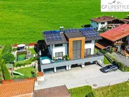 Modernes Einfamilienhaus mit Naturpool &amp; Weitblick – stilvolles Wohnen in Westendorf