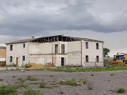 aufgeschlossenes Gewerbegrundstück mit ehemaligem Arbeiterquartier in Bestlage von Wöllersdorf