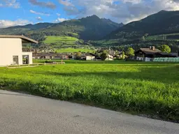 Voll erschlossenes Baugrundstück in 5722 Niedernsill, mit Blick auf die Gipfel der Hohen Tauern