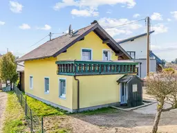 SANIERUNGSBEDÜRFTIGES EINFAMILIENHAUS MIT 3 GARAGENSTELLPLÄTZEN IN MUNDERFING