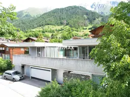 Eine Villa in alpiner Umgebung - ausgezeichnete Architektur, hochwertige Bauausführung