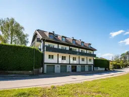Reizende 3-Zimmer-Wohnung mit 2 Balkonen, gartenseitiger Veranda und Garagenplatz