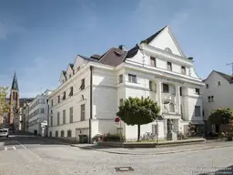 Stilvolle 2-Zimmer-Altbauwohnung in der ehemaligen Bregenzer Nationalbank – Exklusives Wohnen im Herzen der Fußgängerzone