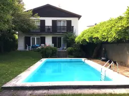 NONNTAL | Charmantes Einfamilienhaus mit blickgeschütztem Garten und Pool in bester Lage