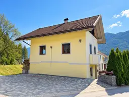 DOPPELHAUSHÄLFTE IN KÄRNTEN - RAUMWUNDER IN SONNIGER WALDRANDLAGE IN IRSCHEN/GRÖFELHOF