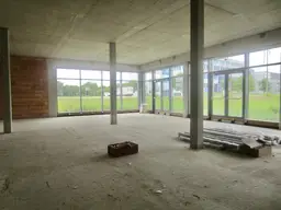 Büro Geschäftslokal im EG (derzeit Edelrohbau) Vermietung Gewerbeobjekt - 4030 Linz, Im Südpark