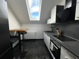 Modernisierte Dachgeschosswohnung mit Balkon &amp; Blick auf die Burgruine Kirchschlag