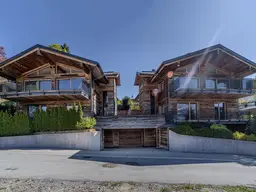 Edle Chalets in „Ski-in &amp; Ski-out“-Lage mit imposanten Kaiserblick