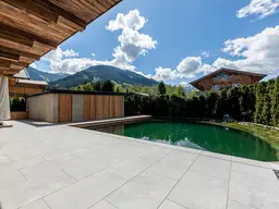 Edle Residenzen in Aurach - Top 1Gartenwohnung mit Schwimmteich