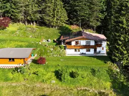 Wohnen über Waidring mit Blick auf die Loferer Steinberge (06059)