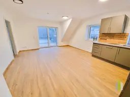 Erstbezug! Moderne 2-Zi.-Dachgeschoß-Wohnung mit großen Balkon