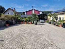 Vielseitiges Raumwunder an der Grenze - Modernes Wohnen und Arbeiten unter einem Dach