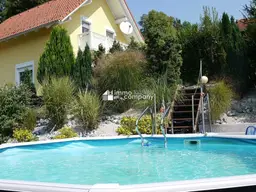 Moderne Traumimmobilie in Raaba-Grambach - Großzügiges Einfamilienhaus mit Pool in Garten, Garage mit el. Rolltor und Solarenanlage für 690.000,00 €