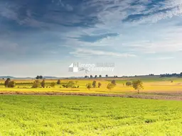 Gut geschnittenes Baugrundstück mit Fernblick direkt an den Feldern in Ruhelage