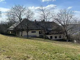 Mehrfamilienhaus plus unbebautem Grundstück