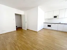 sehr hübsche Neubauwohnung mit Balkon, Gemeinschaftsgarten und Garage
