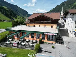 Mehrfamilienhaus mit ausgezeichnetem Restaurant in absoluter Bestlage von Rauris